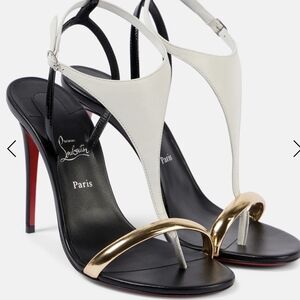 Christian Louboutin Women's Black and Gold Heels.